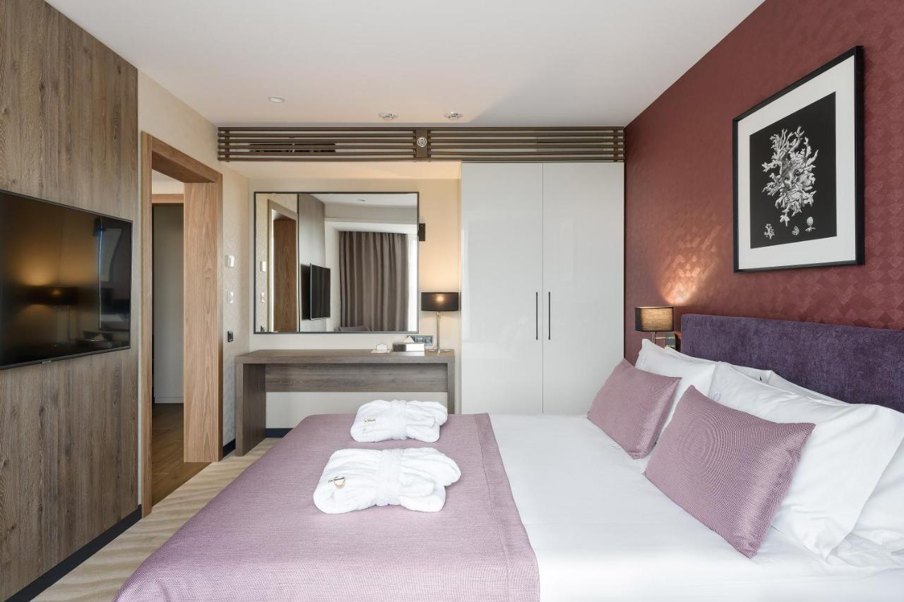Premier Hotel אודסה מראה חיצוני תמונה A bedroom at the hotel